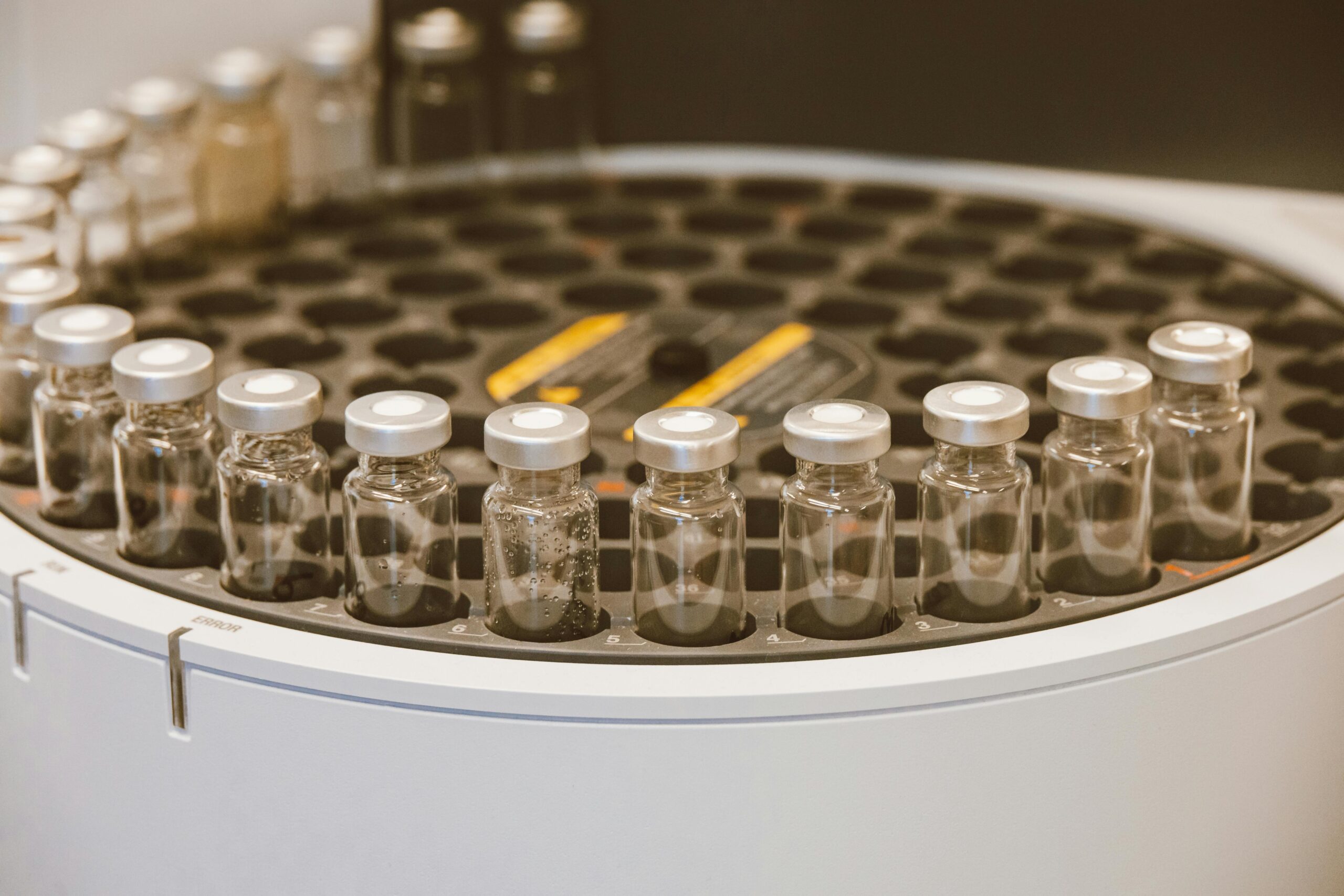Clear Glass Vials on Round Container